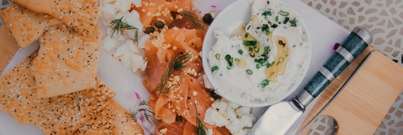 Pastry, dip, fresh fish and vegetables